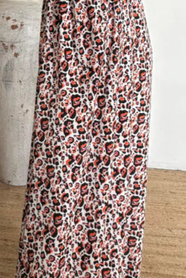 green fabric with orange flowers