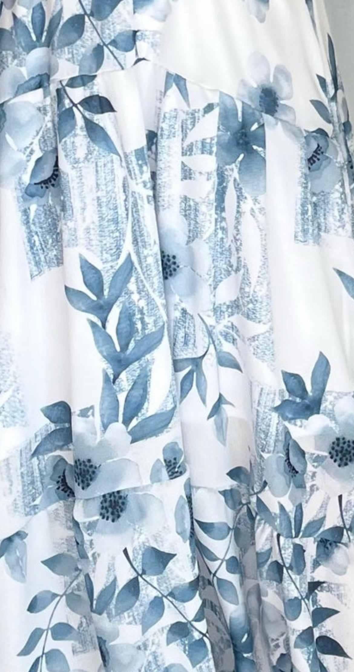 white fabric blue flowers